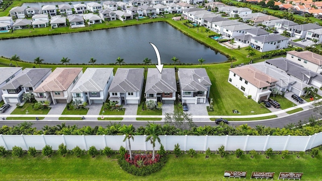 aerial view featuring a water view and a residential view