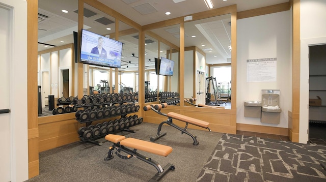 exercise room with recessed lighting