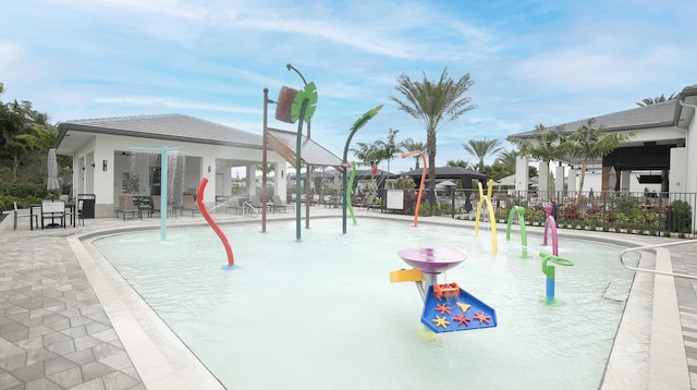 surrounding community with fence, a gazebo, and a patio