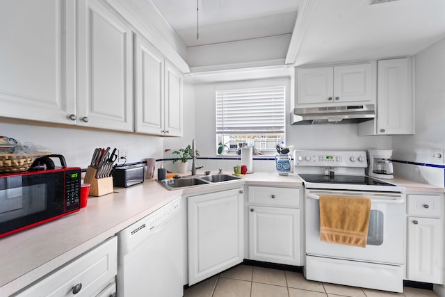 kitchen with white cabinetry, light tile patterned flooring, white appliances, and sink