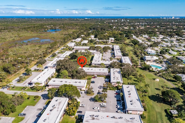 drone / aerial view featuring a water view