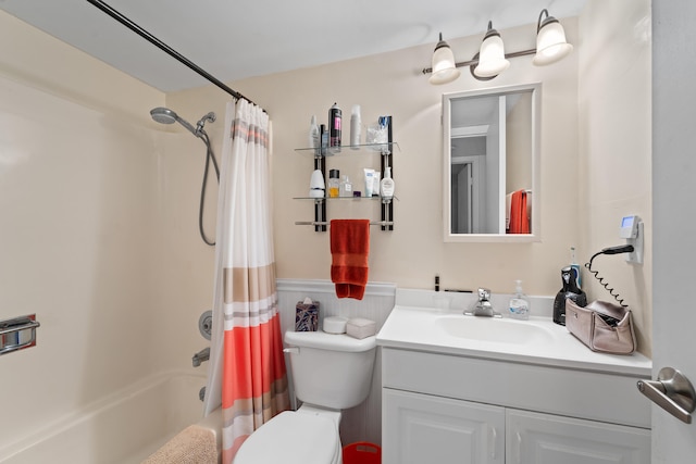 full bathroom featuring vanity, toilet, and shower / bath combo with shower curtain