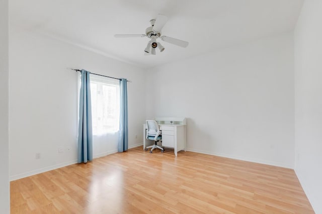 unfurnished room with ceiling fan and light hardwood / wood-style flooring