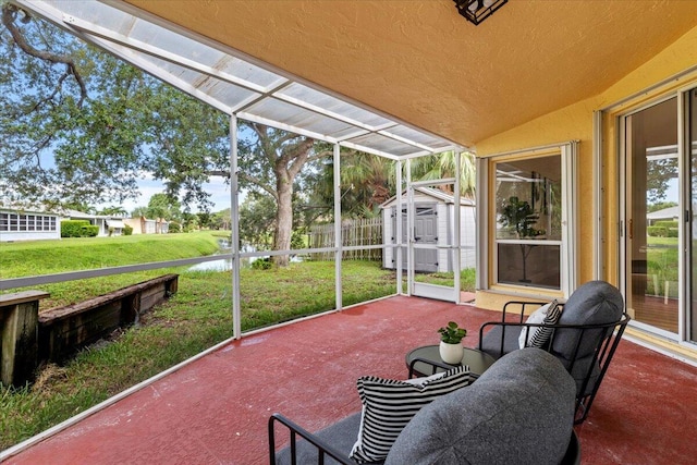 sunroom / solarium featuring vaulted ceiling