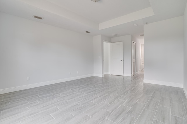 empty room with light hardwood / wood-style floors