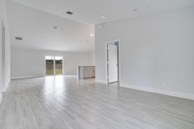 unfurnished room featuring light wood-type flooring