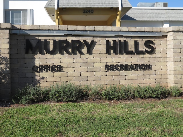 view of community sign