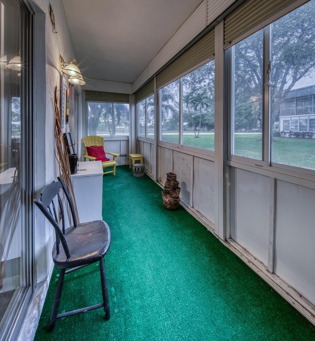 unfurnished sunroom with a wealth of natural light