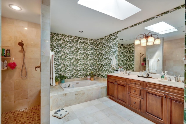 bathroom with vanity, plus walk in shower, and a skylight