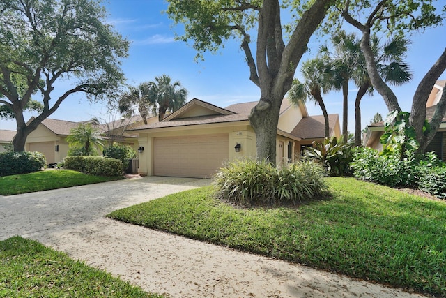 single story home featuring a garage