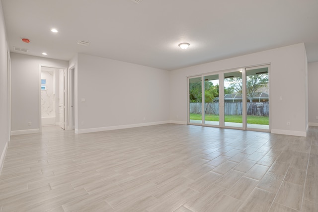 unfurnished room featuring light hardwood / wood-style flooring