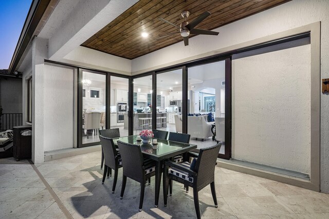 110 Echelon Crest Trl, Jupiter, FL 33478 - dining space with wooden ceiling, a textured wall, ceiling fan, and light stone finish floors