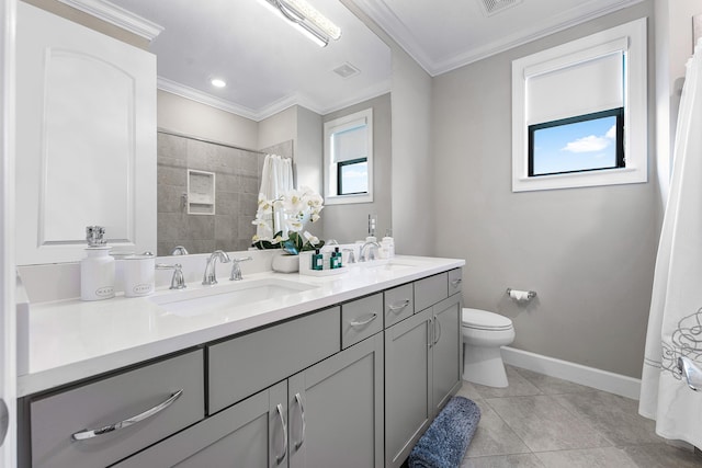 bathroom featuring crown molding, tile patterned flooring, vanity, and toilet