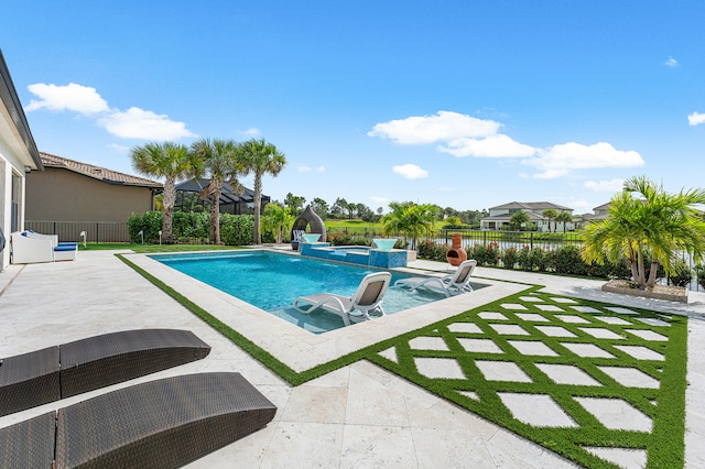 view of swimming pool featuring a patio area