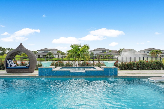 view of pool with pool water feature