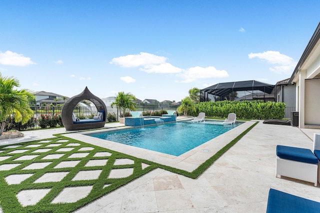 view of pool featuring pool water feature, a patio area, and an in ground hot tub