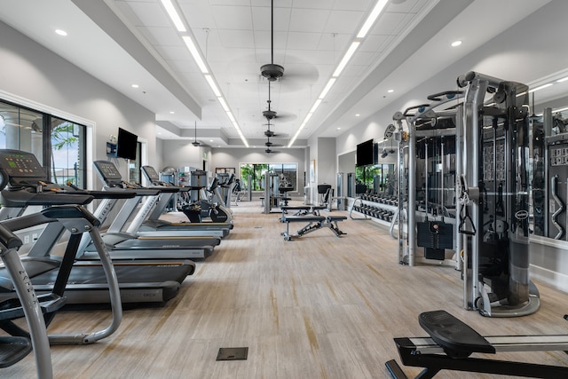 gym featuring light hardwood / wood-style floors