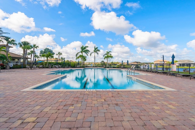 110 Echelon Crest Trl, Jupiter, FL 33478 - community pool featuring a patio area