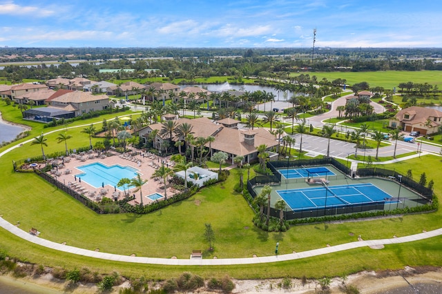 birds eye view of property featuring a water view