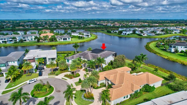 drone / aerial view featuring a water view