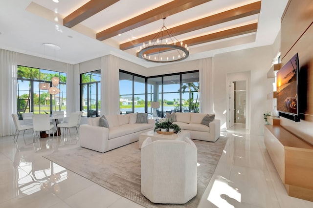 tiled living room featuring an inviting chandelier and beamed ceiling