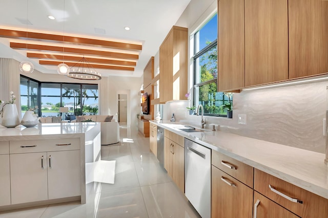 kitchen with sink, white cabinets, beamed ceiling, light tile patterned flooring, and stainless steel dishwasher