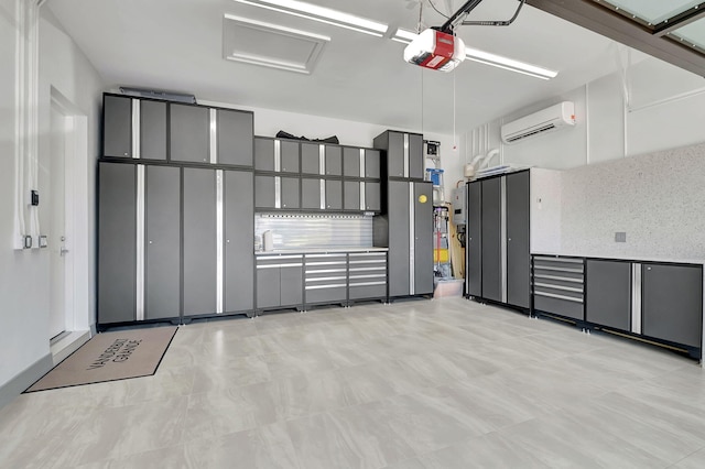 garage with a garage door opener and an AC wall unit