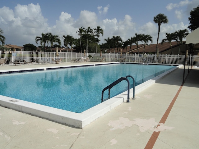 view of pool featuring a patio area