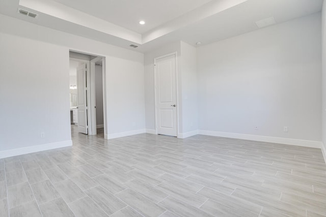 unfurnished room featuring light hardwood / wood-style flooring