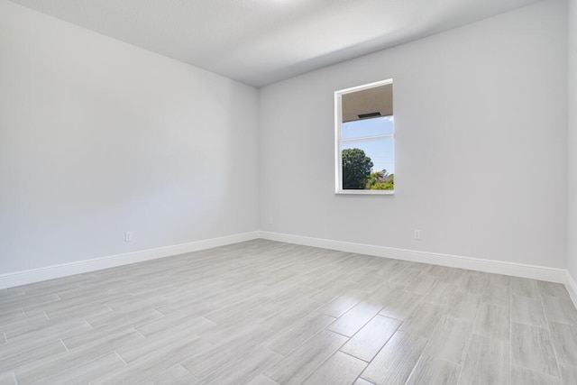 empty room with light wood-type flooring