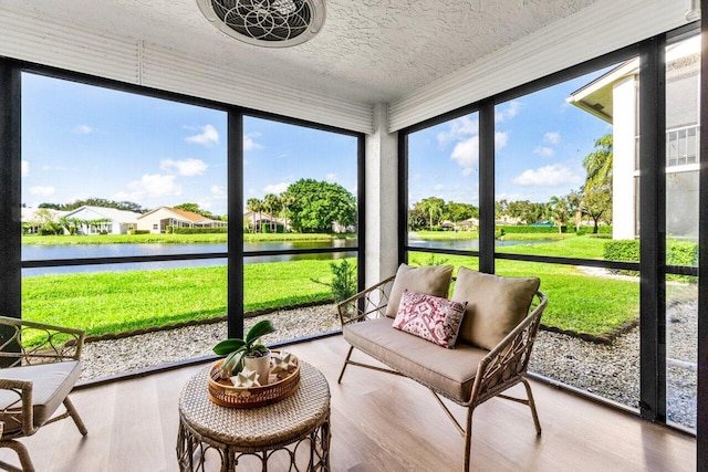 sunroom with a water view