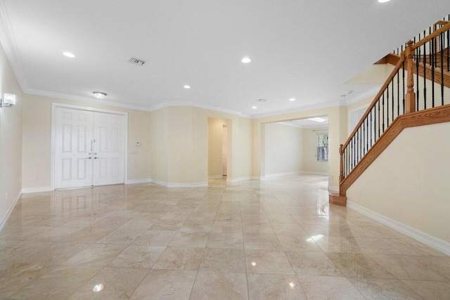 empty room featuring ornamental molding