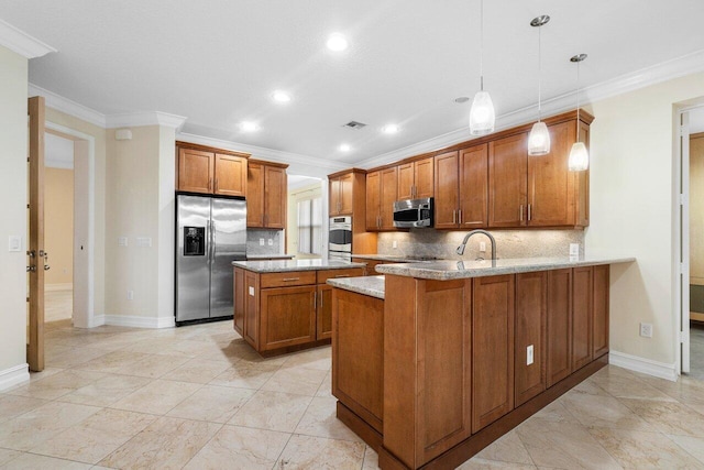 kitchen featuring light stone countertops, hanging light fixtures, backsplash, kitchen peninsula, and appliances with stainless steel finishes