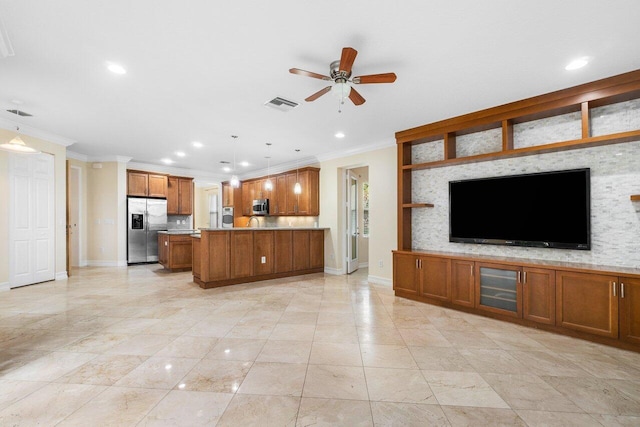 unfurnished living room with ceiling fan and ornamental molding