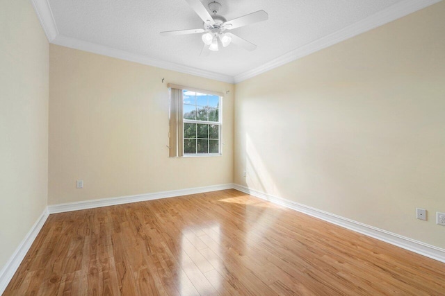 unfurnished room with crown molding, ceiling fan, light hardwood / wood-style floors, and a textured ceiling