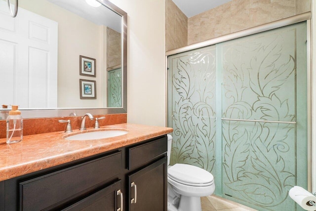 bathroom with walk in shower, tile patterned flooring, vanity, and toilet