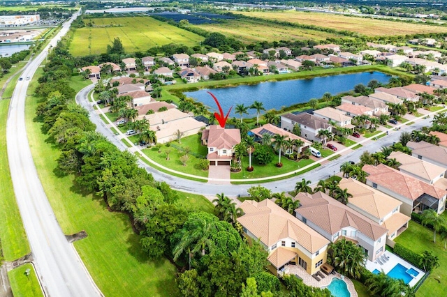 drone / aerial view with a water view