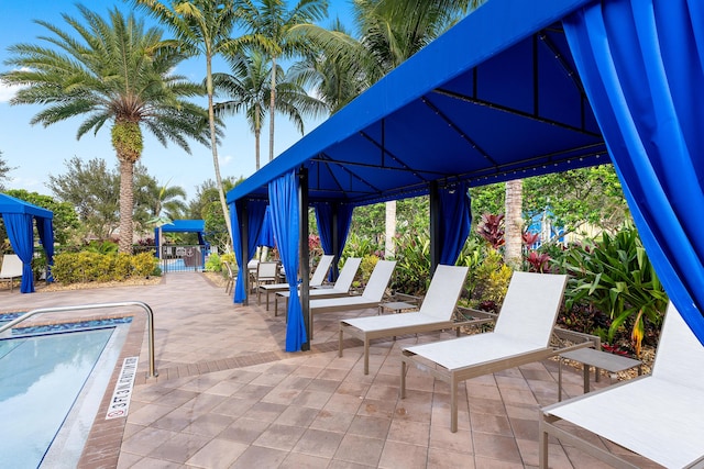 view of patio featuring a community pool