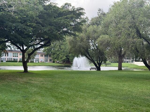 surrounding community featuring a yard