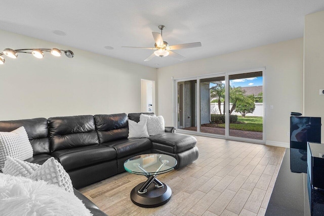 living room with ceiling fan