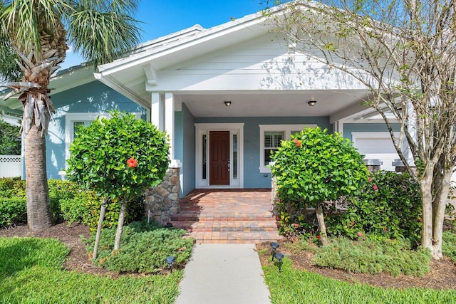 entrance to property with a porch