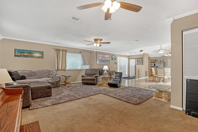 dining area with concrete flooring, washer / dryer, a textured ceiling, and ceiling fan