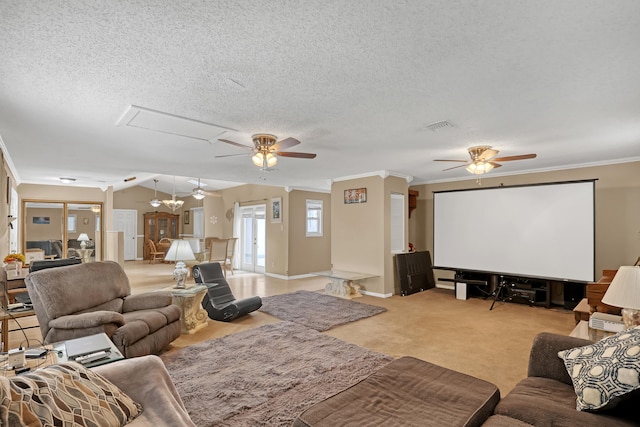 living room featuring wood-type flooring, a textured ceiling, ceiling fan, and crown molding