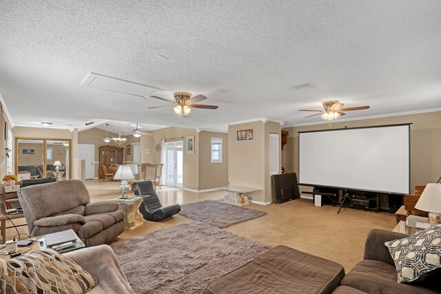 living room featuring wood-type flooring, a textured ceiling, ceiling fan, and crown molding