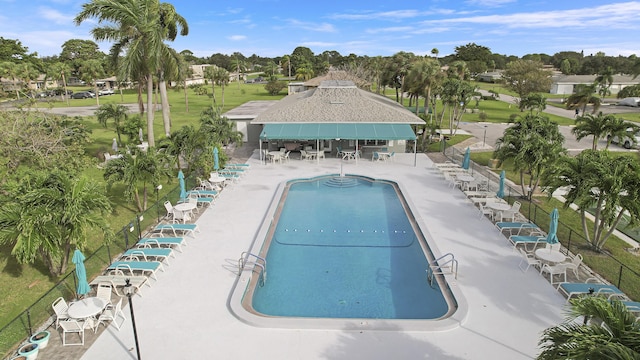 view of swimming pool with a patio