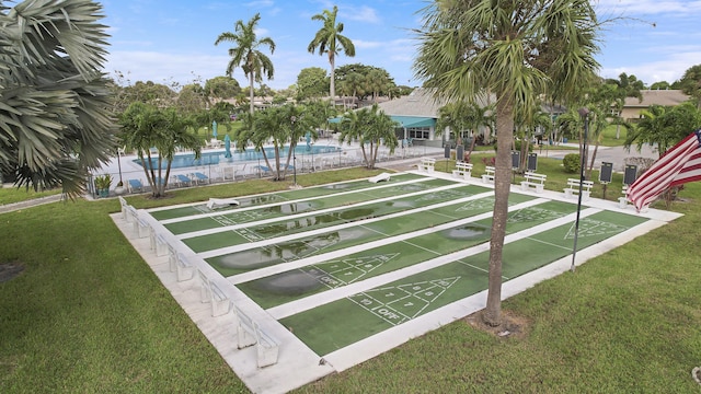 view of community with a lawn