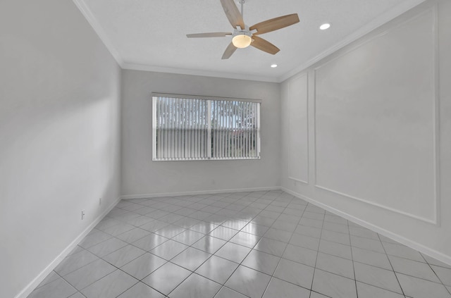 tiled spare room featuring ceiling fan and crown molding