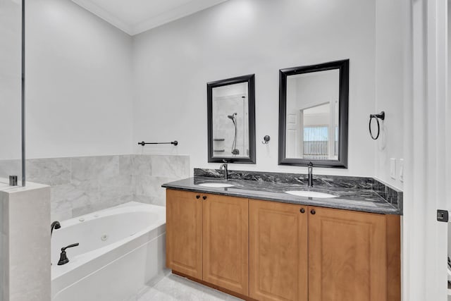 bathroom with vanity, tiled tub, and ornamental molding