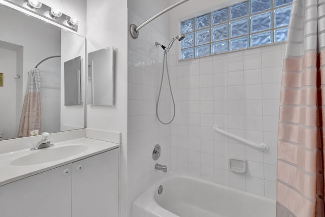 bathroom with vanity and shower / tub combo