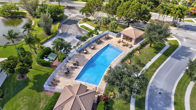 birds eye view of property featuring a water view